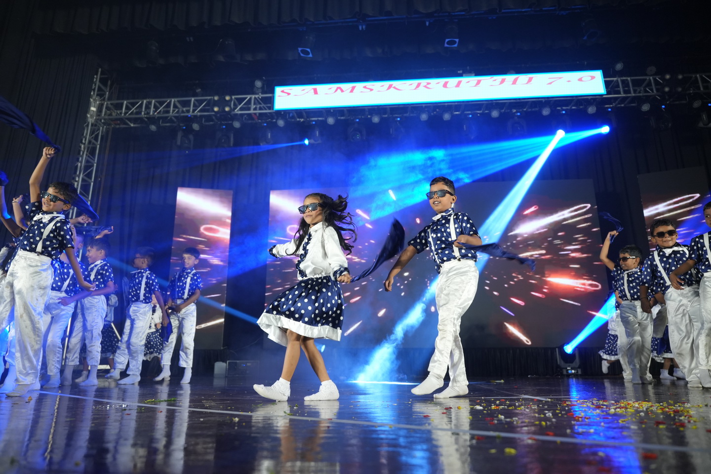 Students performing drama on stage